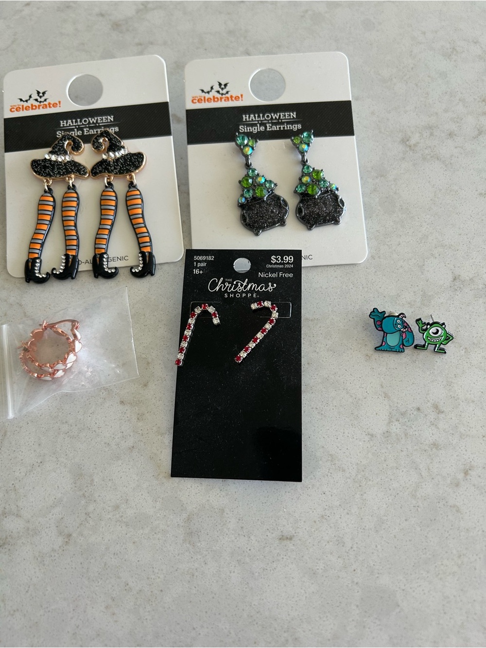 Festive Halloween Witch Leg Drop Earrings — Orange & Black
